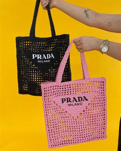 prada white raffia bucket bag|designer raffia handbags for summer.